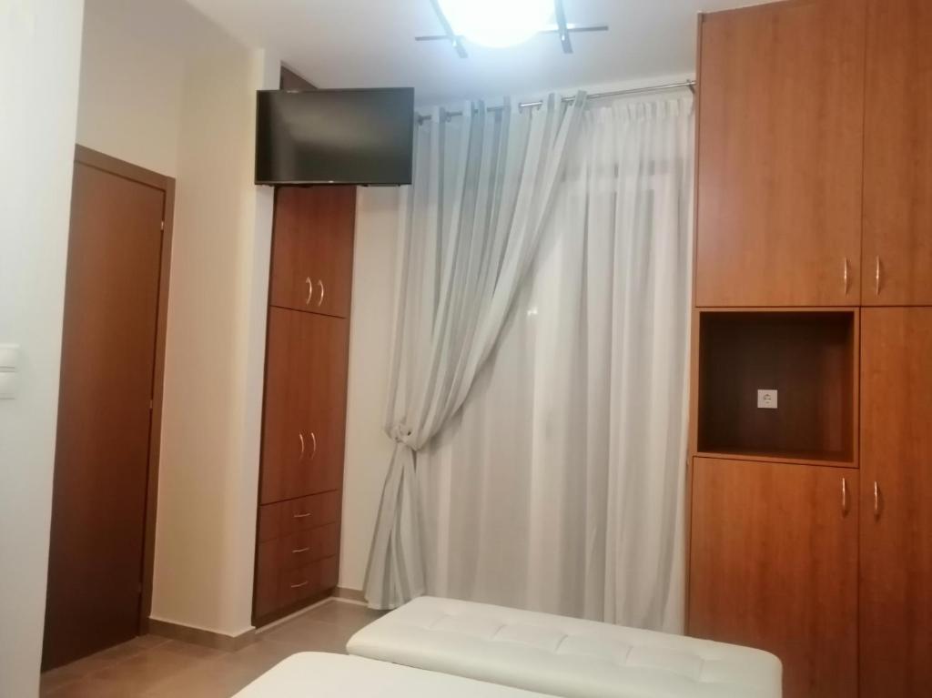 Postel nebo postele na pokoji v ubytování Malvazios Villas #6