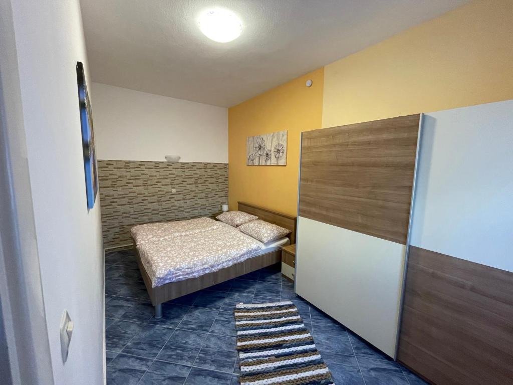 Posteľ alebo postele v izbe v ubytovaní Orangerie