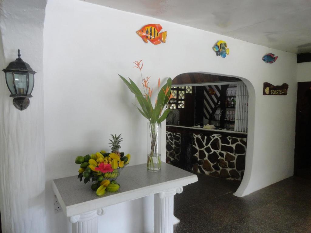 Kuchyň nebo kuchyňský kout v ubytování Lazare Picault Hotel