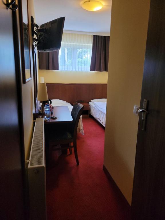 Postel nebo postele na pokoji v ubytování Virgo B&B Biznes Rumia