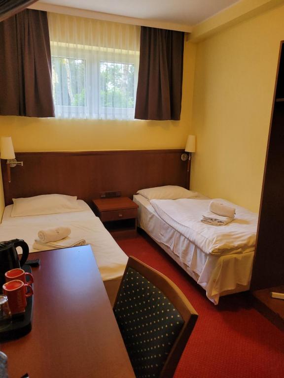 Postel nebo postele na pokoji v ubytování Virgo B&B Biznes Rumia