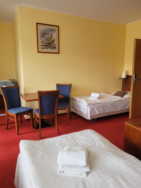 Postel nebo postele na pokoji v ubytování Virgo B&B Biznes Rumia