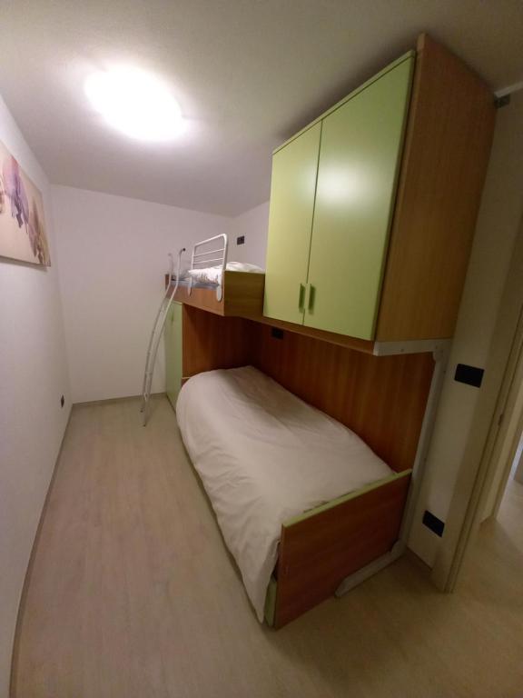 Postel nebo postele na pokoji v ubytování Casa con vista a Moena