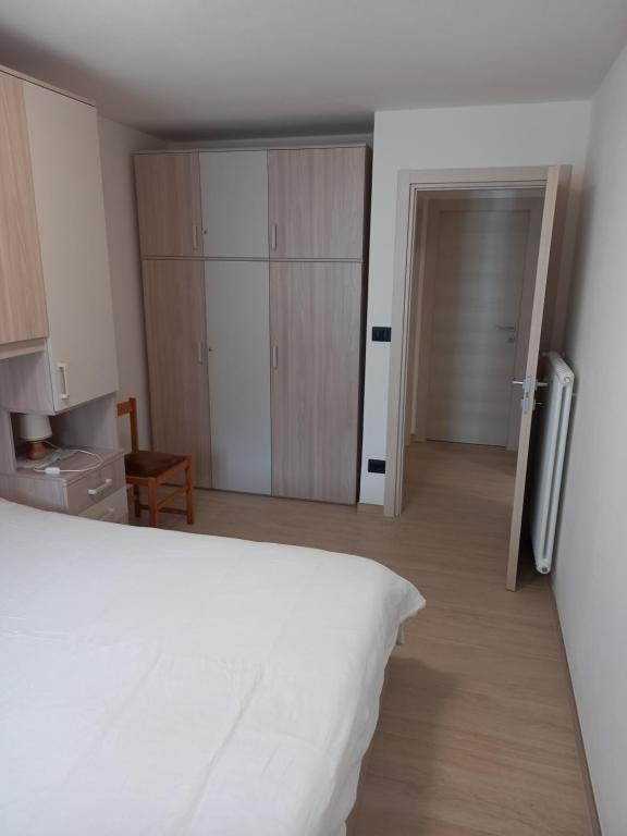 Postel nebo postele na pokoji v ubytování Casa con vista a Moena