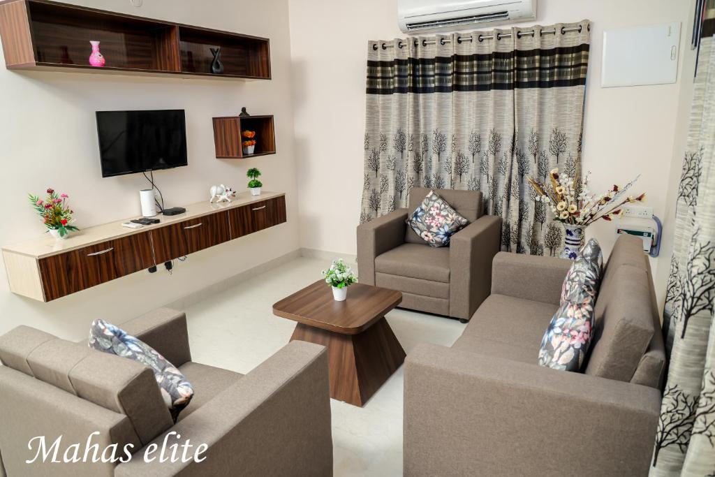 Гостиная зона в MAHAS Elite by MAHAS Homestays - 2BHK Flats - Fully Airconditioned