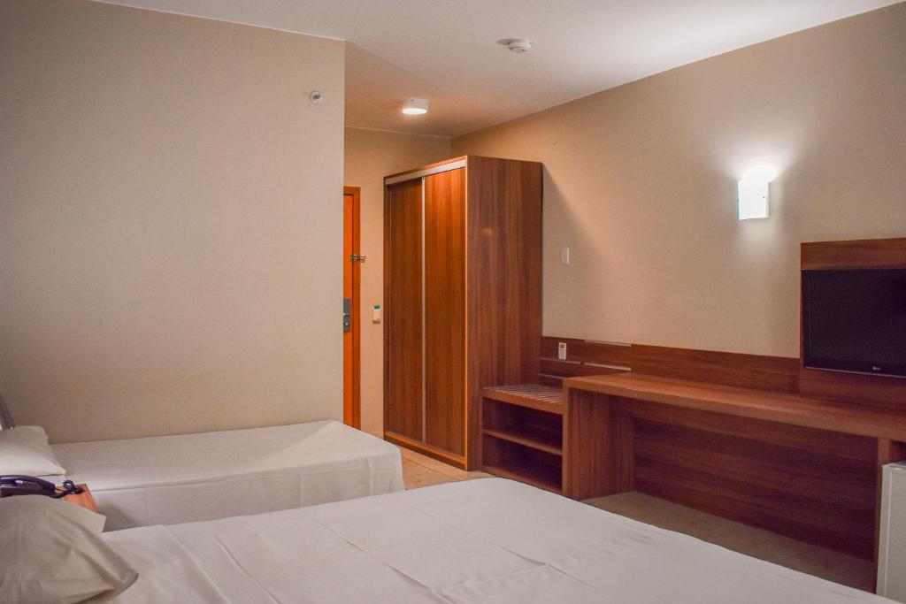 Postel nebo postele na pokoji v ubytování Ecologic Ville Resort - Oficial