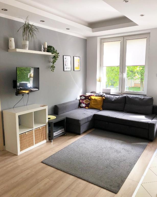 Televízia a/alebo spoločenská miestnosť v ubytovaní Warszawska 1 Apartament Giżycko