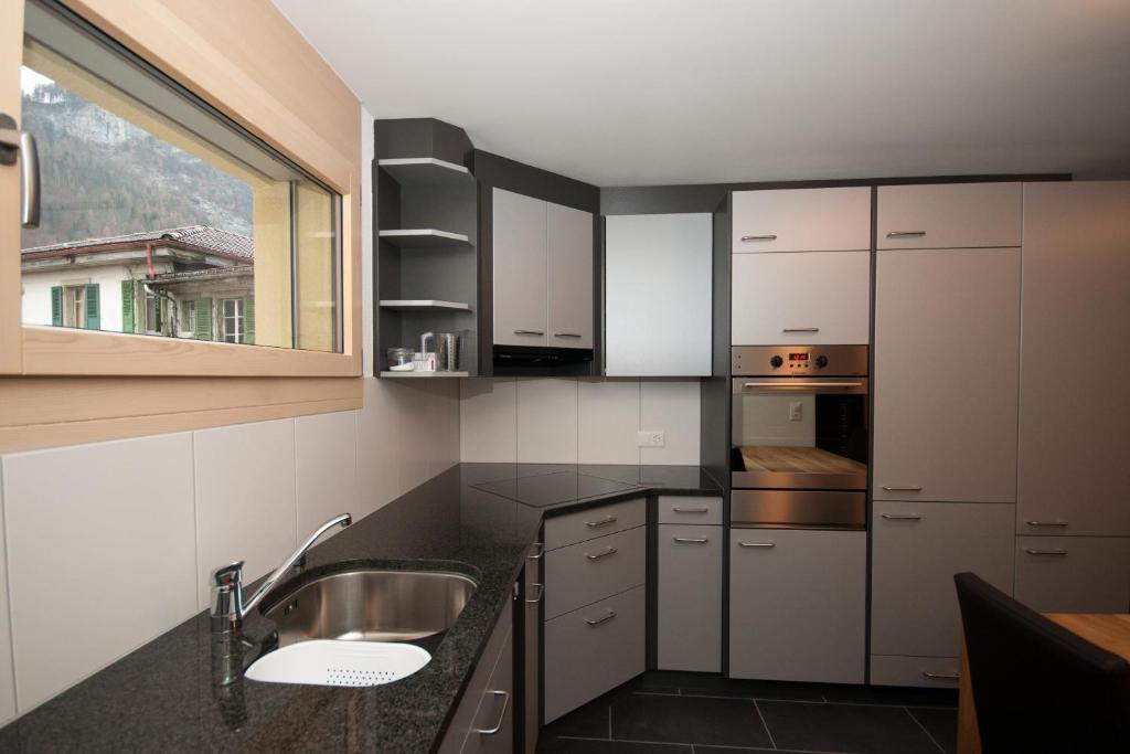 Kuchyň nebo kuchyňský kout v ubytování Alpbachstrasse 4, Meiringen
