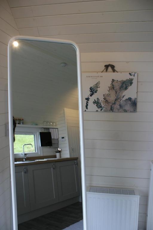 Kuchyň nebo kuchyňský kout v ubytování Strathy Bay Pods