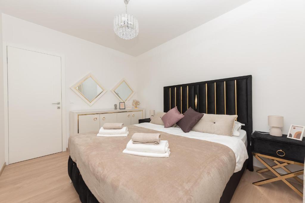 Posteľ alebo postele v izbe v ubytovaní Luxury Apartment SMILE-Sea View