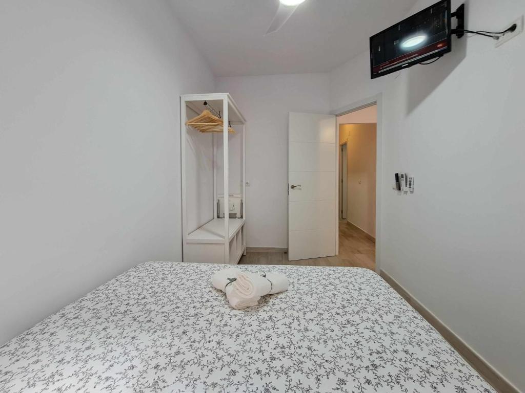 Posteľ alebo postele v izbe v ubytovaní Puerto benidorm center