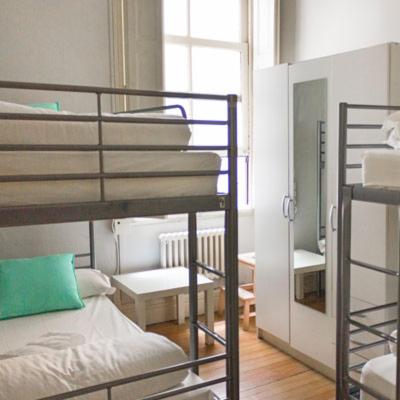 Postel nebo postele na pokoji v ubytování Zentric Hostel
