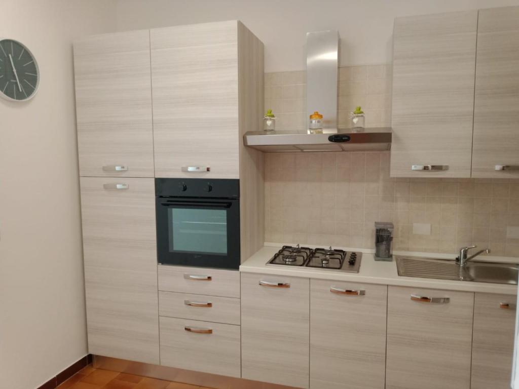 Kuchyň nebo kuchyňský kout v ubytování Casa Riva Levante