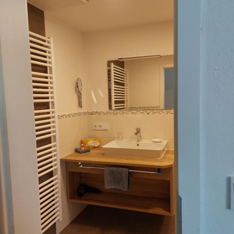 Koupelna v ubytování Hotel Garni Malerwinkl