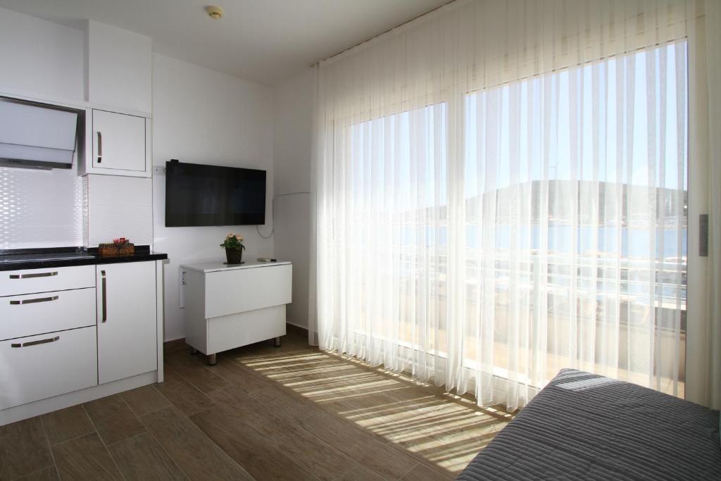 TV a/nebo společenská místnost v ubytování Ufuk Otel