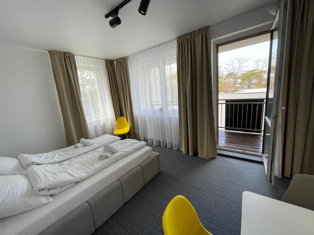 Posteľ alebo postele v izbe v ubytovaní Apartament Planeta Mielno 114 Premium