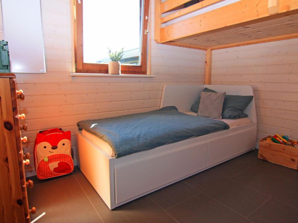 Postel nebo postele na pokoji v ubytování Blockhaus in Damp