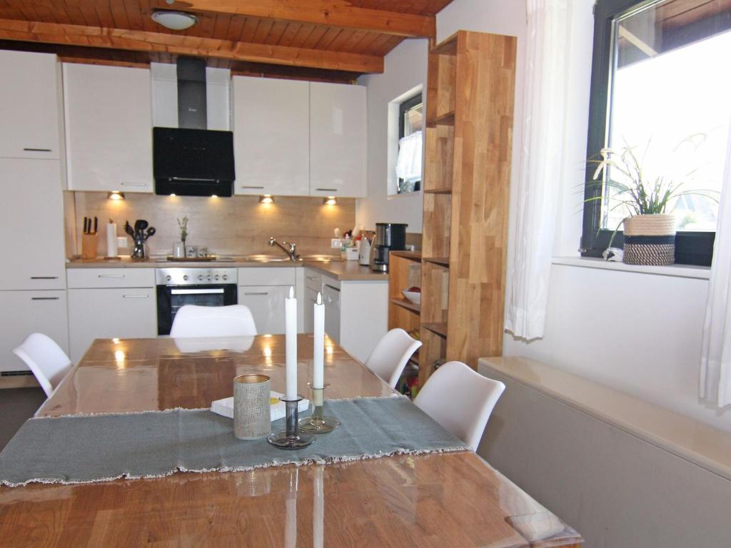 Kuchyň nebo kuchyňský kout v ubytování Blockhaus in Damp