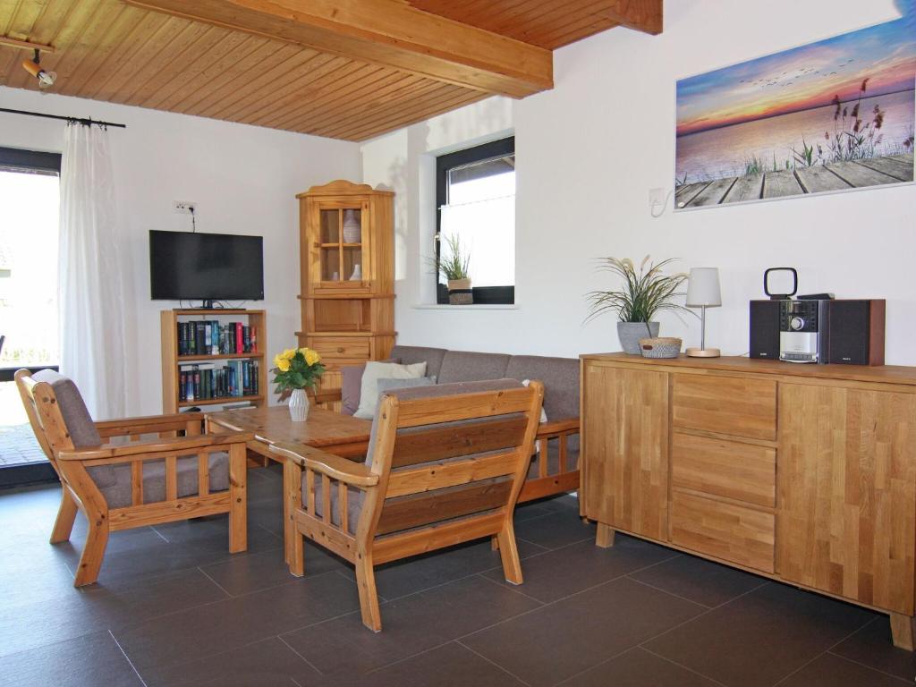 TV a/nebo společenská místnost v ubytování Blockhaus in Damp