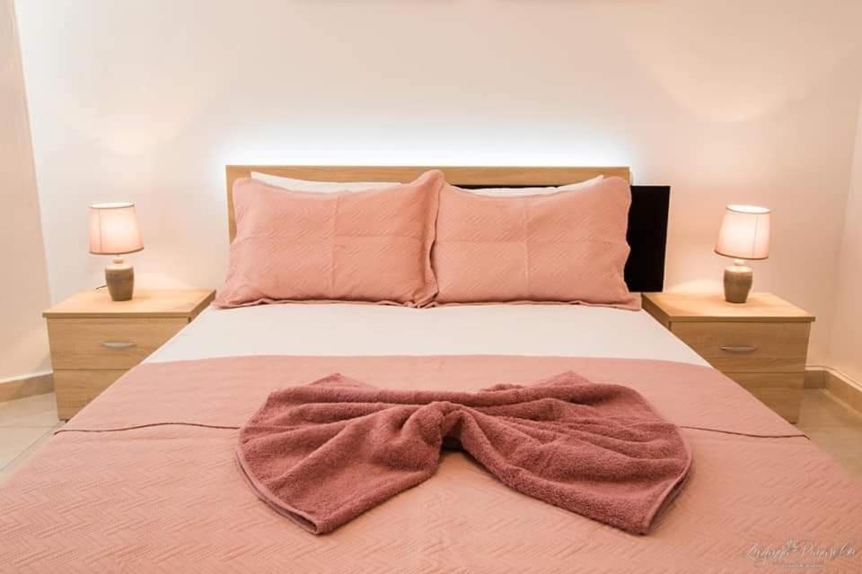 Postel nebo postele na pokoji v ubytování Soleil Apt 2