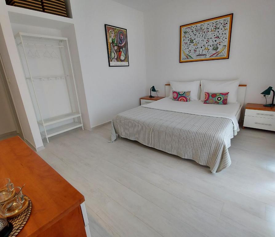 Postel nebo postele na pokoji v ubytování Guest House Mediterranean
