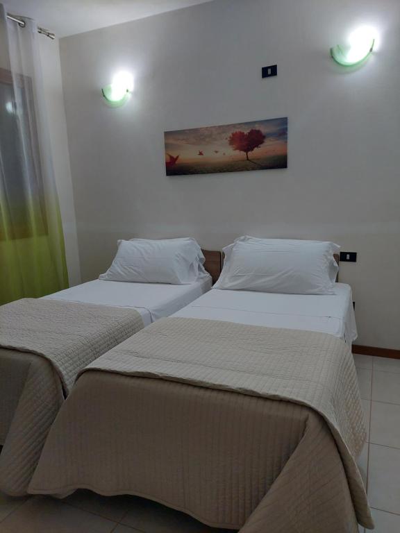 Postel nebo postele na pokoji v ubytování B&B Marku