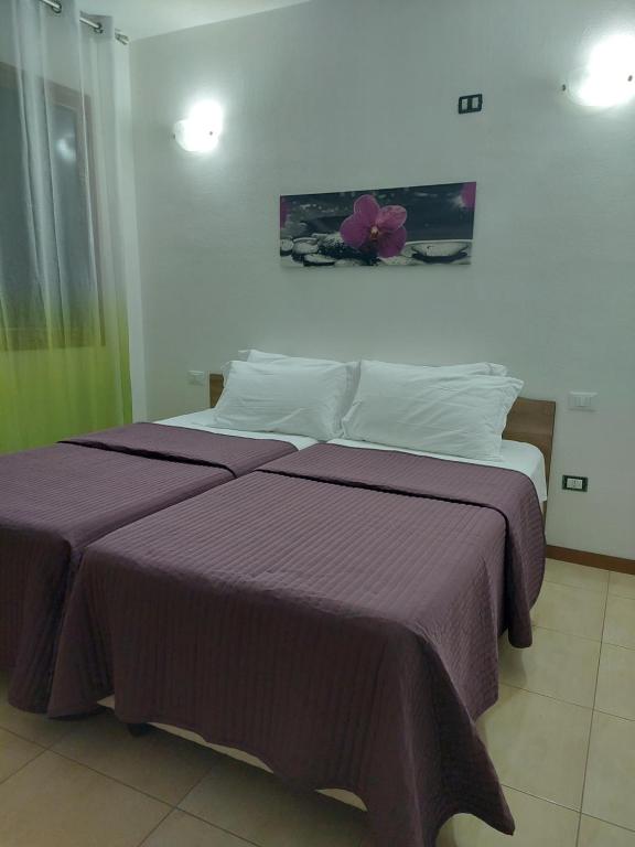 Postel nebo postele na pokoji v ubytování B&B Marku