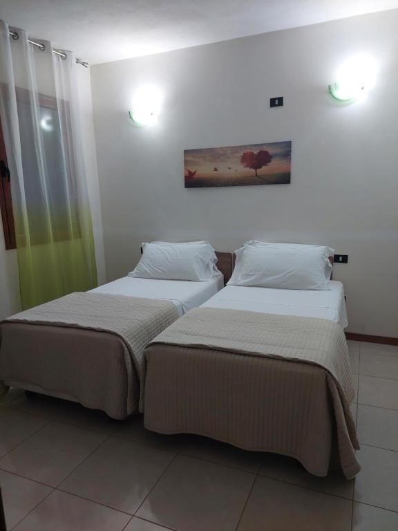 Postel nebo postele na pokoji v ubytování B&B Marku