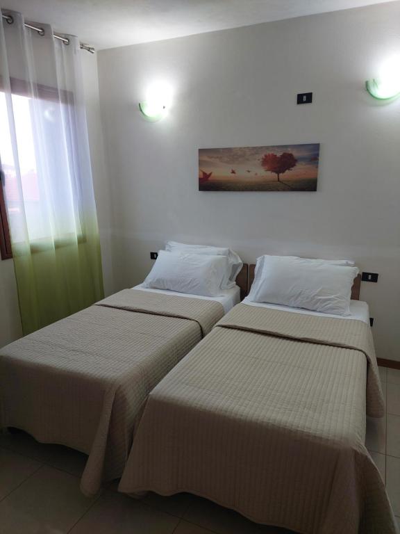 Postel nebo postele na pokoji v ubytování B&B Marku