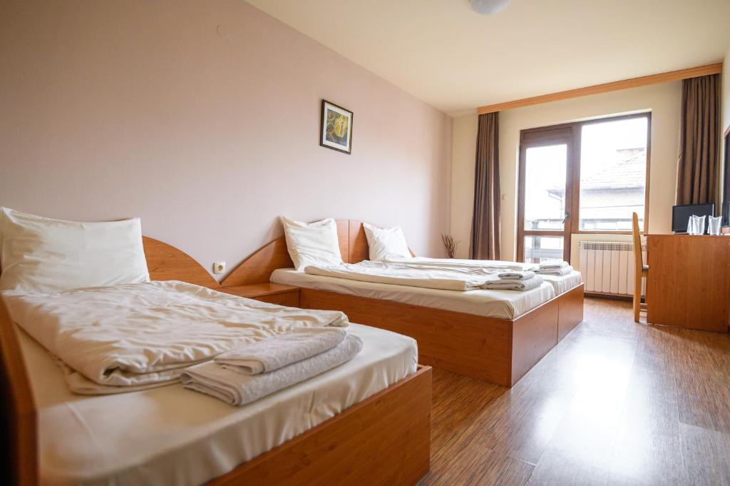 Katil atau katil-katil dalam bilik di Hotel Saint Nicola
