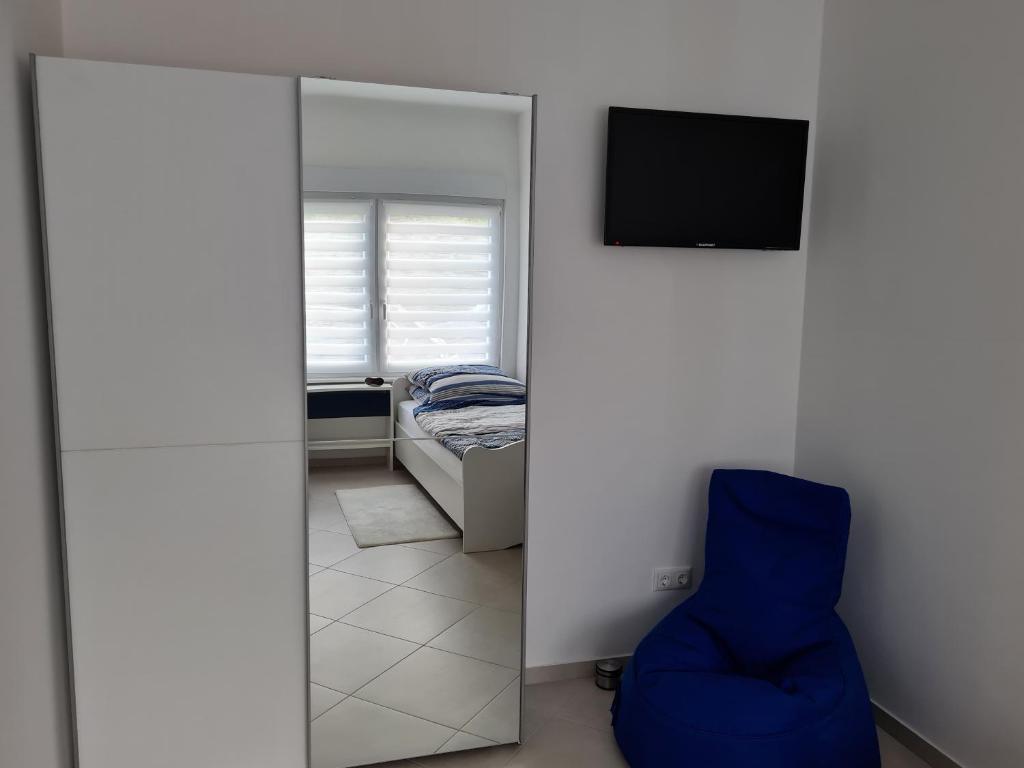 TV a/nebo společenská místnost v ubytování Ferienhaus an der Saar