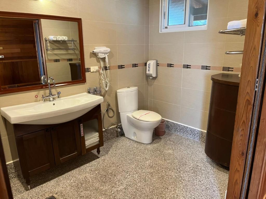 Koupelna v ubytování Ye Jiang Hua Homestay