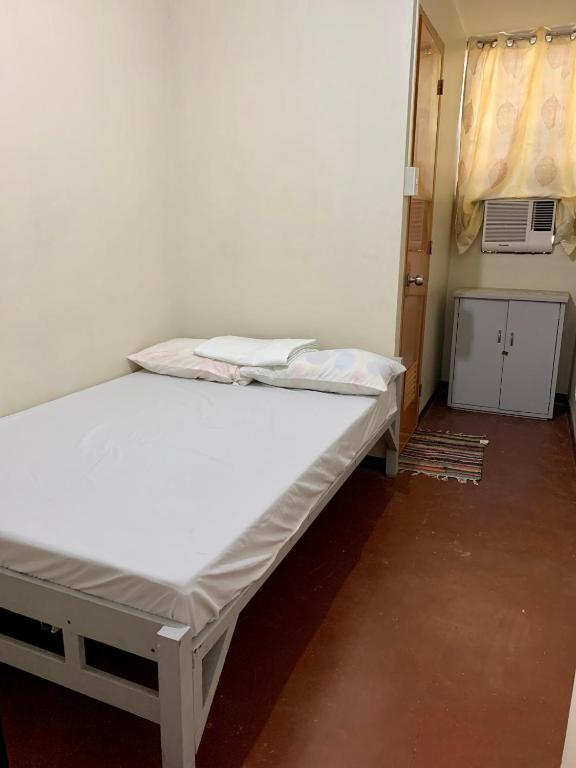 Postel nebo postele na pokoji v ubytování Mybed Dormitory