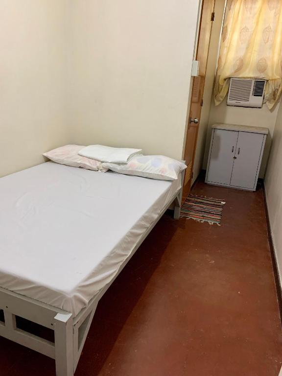 Postel nebo postele na pokoji v ubytování Mybed Dormitory