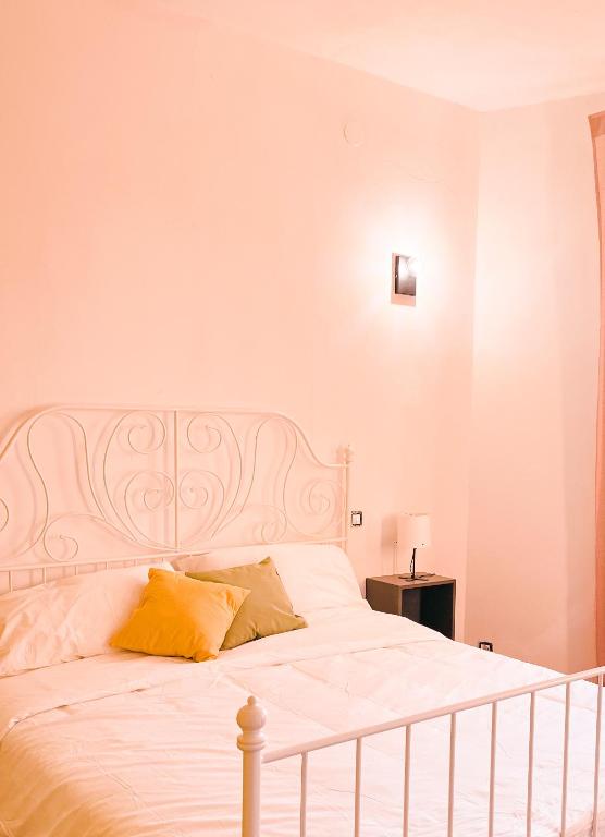 Postel nebo postele na pokoji v ubytování Il B&B dei viaggiatori