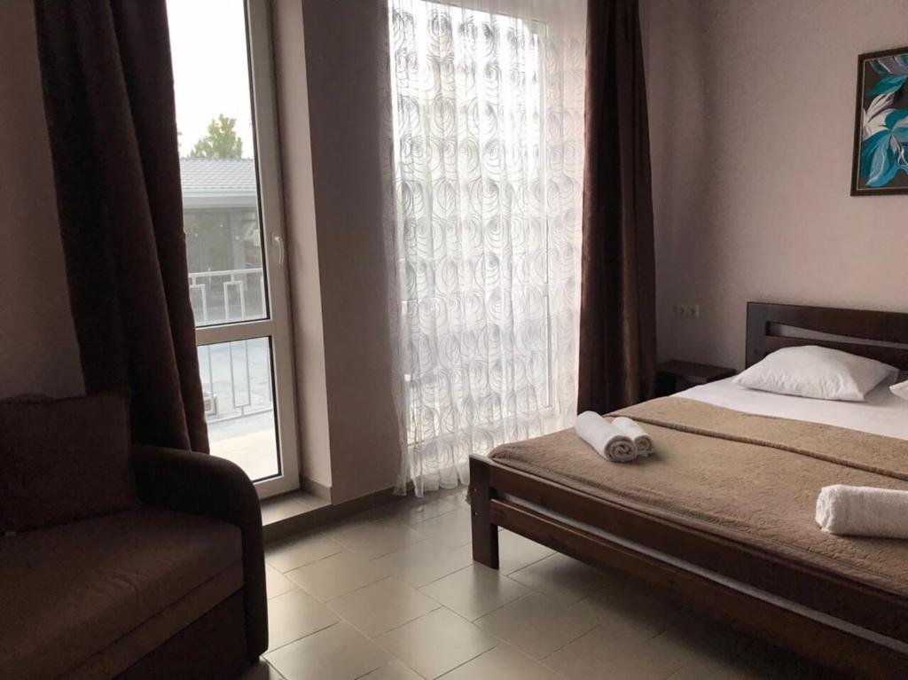 Postel nebo postele na pokoji v ubytování Hotel Golden Beach