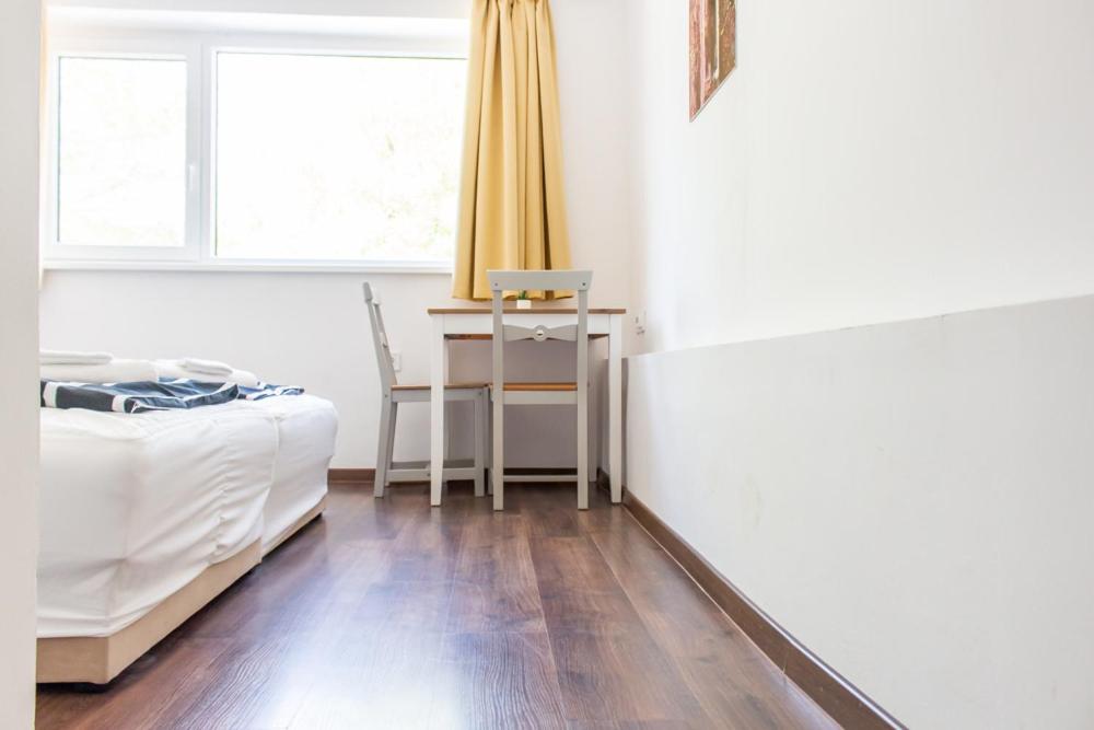 Posteľ alebo postele v izbe v ubytovaní Wesselényi Strand apartmanok