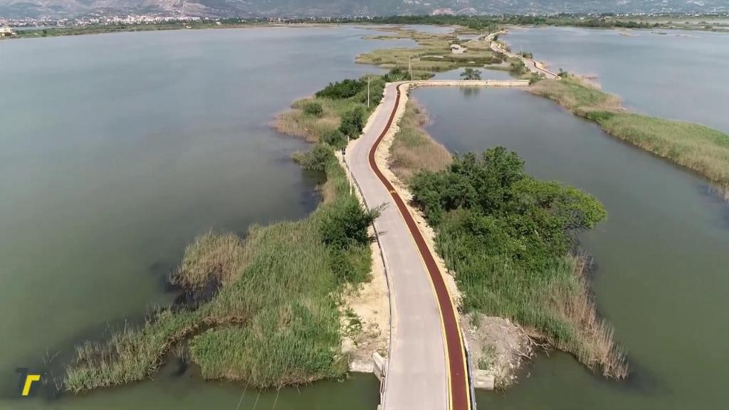 an aerial view of a bridge over a body of water at Hotel MARIO, Shengjin in Shëngjin
