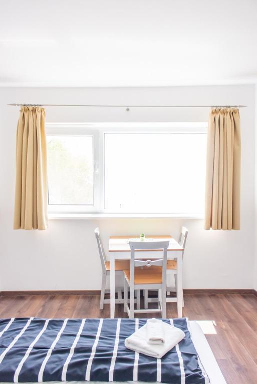 Posteľ alebo postele v izbe v ubytovaní Wesselényi Strand apartmanok