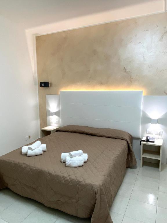 Postel nebo postele na pokoji v ubytování Hotel Bahia