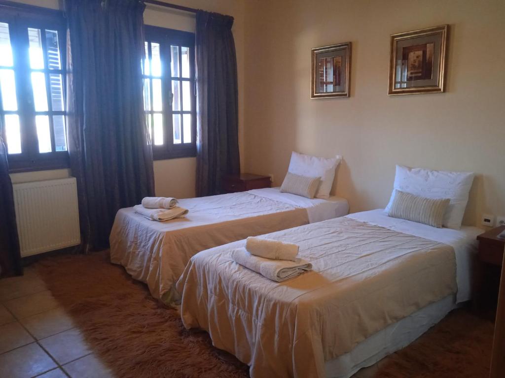 Postel nebo postele na pokoji v ubytování Thiamis Guesthouse