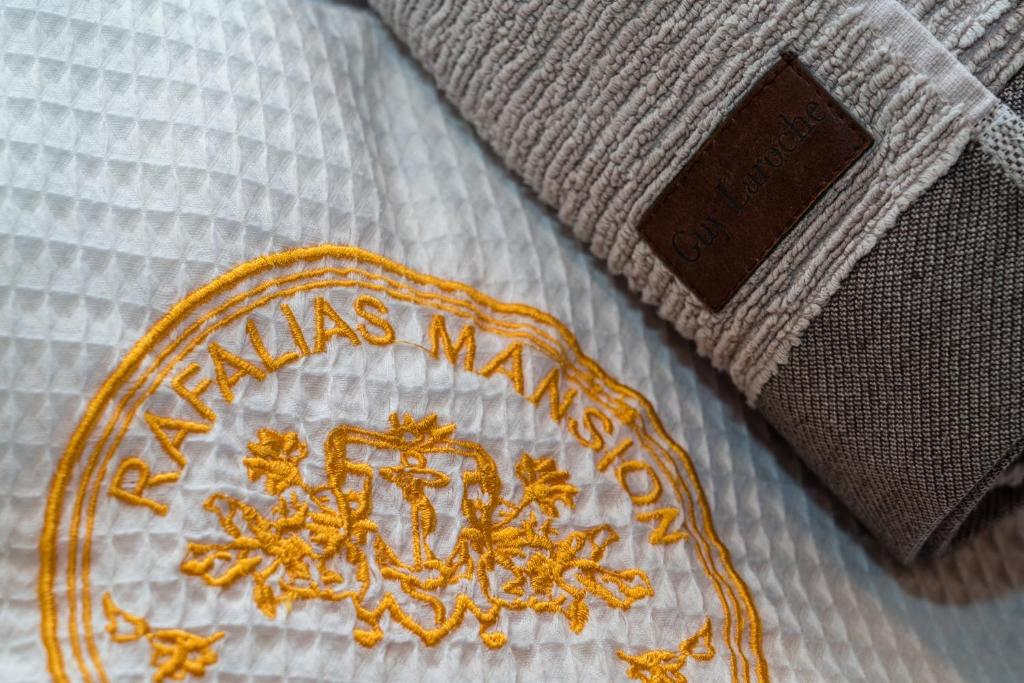 Certifikát, hodnocení, plakát nebo jiný dokument vystavený v ubytování Rafalias Mansion
