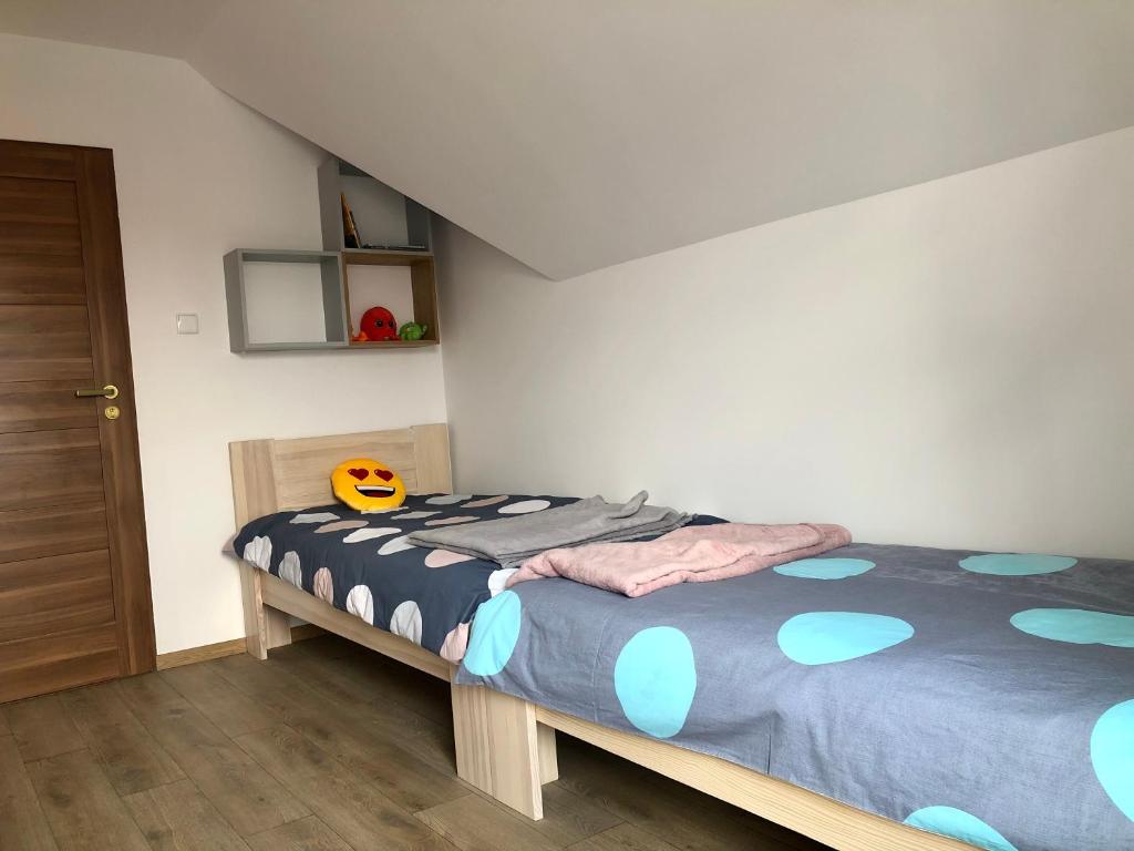 Posteľ alebo postele v izbe v ubytovaní Apartament Rybical - POKOJE