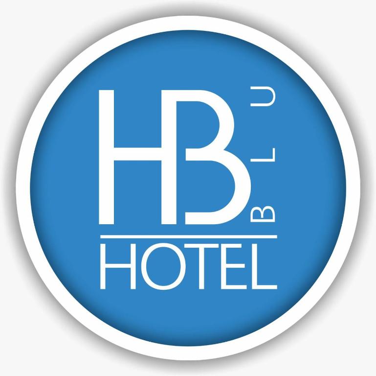 a round blue button with the periodic element hudited at Hotel Blu Cúcuta in Cúcuta