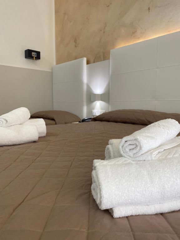 Postel nebo postele na pokoji v ubytování Hotel Bahia