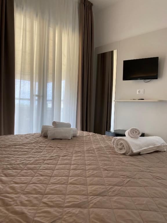 Postel nebo postele na pokoji v ubytování Hotel Bahia