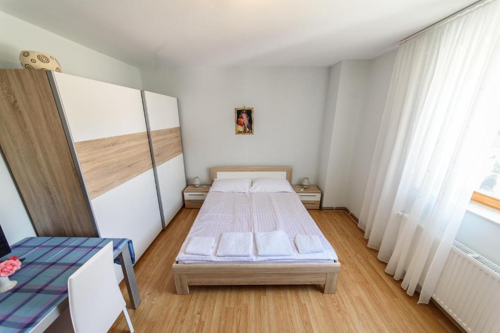 Posteľ alebo postele v izbe v ubytovaní Šoda