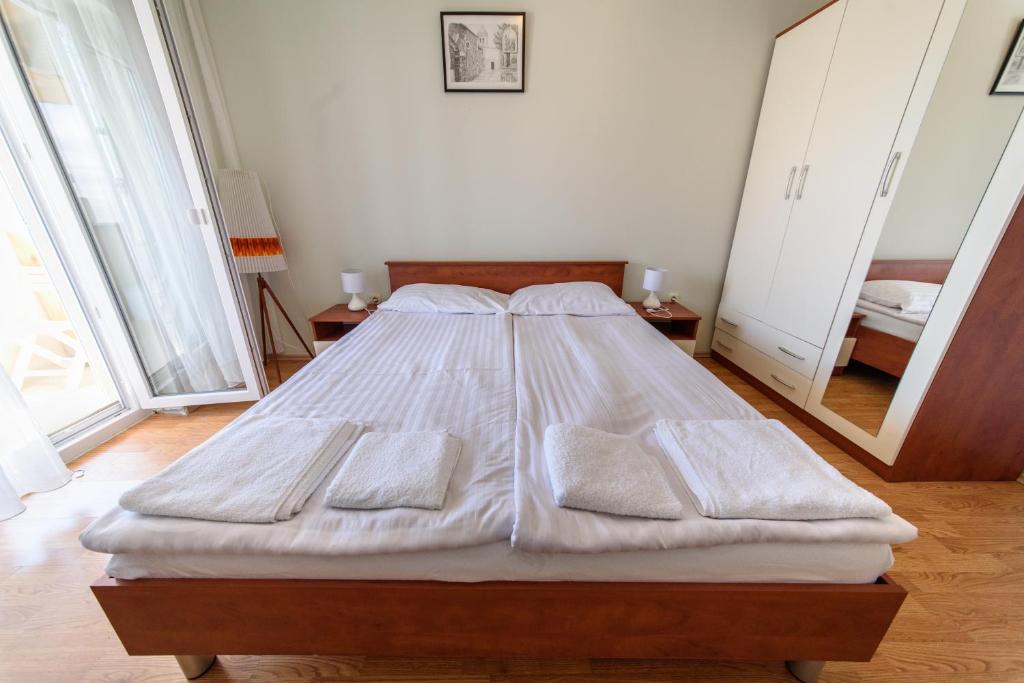 Posteľ alebo postele v izbe v ubytovaní Šoda