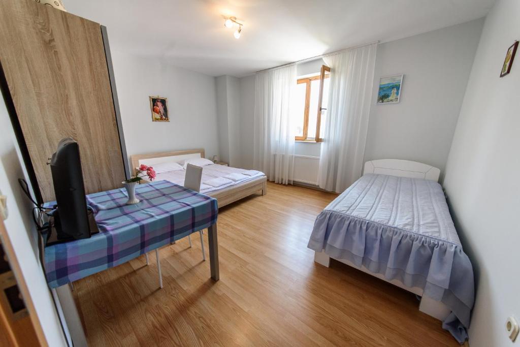 Posteľ alebo postele v izbe v ubytovaní Šoda