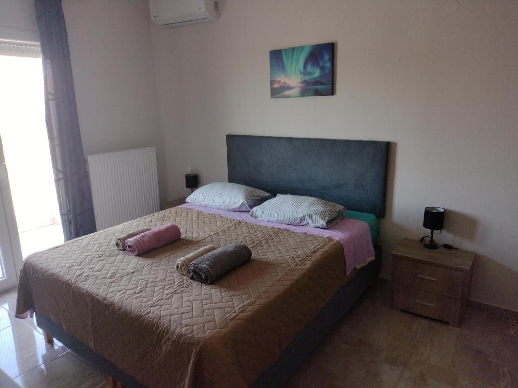 Postel nebo postele na pokoji v ubytování "Thea" Valis Apartments